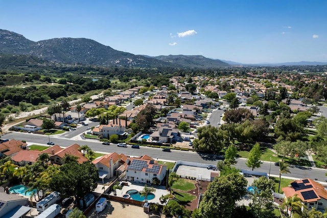 bird's eye view with a residential view and a mountain view