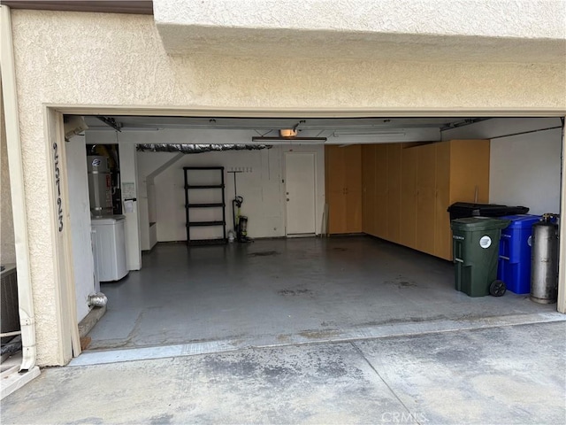 25723 Player Dr, Valencia, CA 91355 - garage with secured water heater and washer / clothes dryer