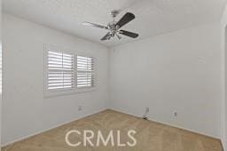 25723 Player Dr, Valencia, CA 91355 - carpeted empty room featuring a ceiling fan and baseboards
