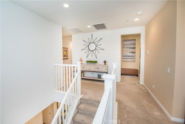11534 Alana Ln, Beaumont, CA 92223 - hallway with recessed lighting, visible vents, light carpet, an upstairs landing, and baseboards