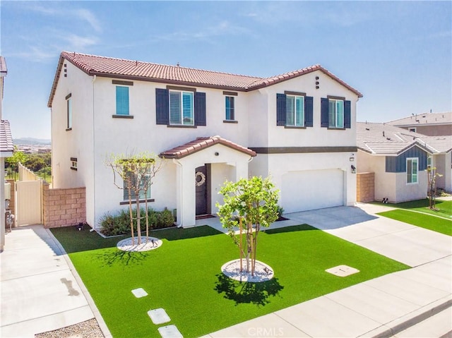 11534 Alana Ln, Beaumont, CA 92223 - mediterranean / spanish-style house with an attached garage, driveway, a tiled roof, and stucco siding