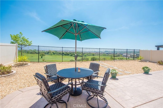 11534 Alana Ln, Beaumont, CA 92223 - view of patio / terrace with outdoor dining space and a fenced backyard