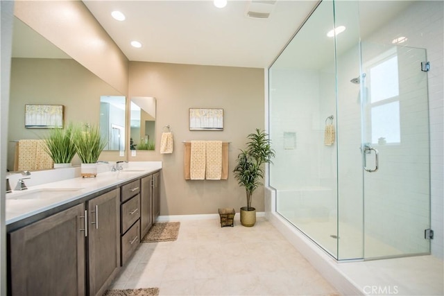 11534 Alana Ln, Beaumont, CA 92223 - full bath featuring a shower stall, baseboards, and a sink