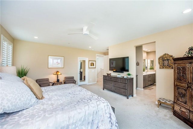 11534 Alana Ln, Beaumont, CA 92223 - bedroom with a ceiling fan, ensuite bathroom, multiple windows, light colored carpet, and recessed lighting