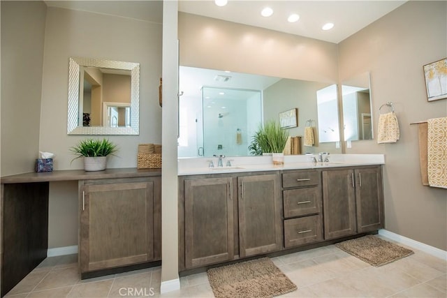 11534 Alana Ln, Beaumont, CA 92223 - full bath featuring baseboards, a sink, and double vanity