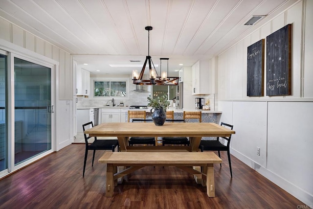 1105 Fulton Rd, San Marcos, CA 92069 - dining area featuring a chandelier, visible vents, and dark wood-style flooring