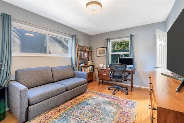 4723 E 3rd St, Long Beach, CA 90814 - home office with baseboards and light wood finished floors