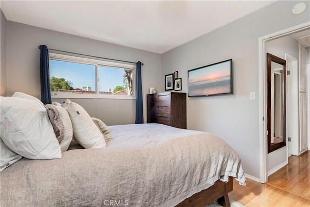4723 E 3rd St, Long Beach, CA 90814 - bedroom featuring baseboards and wood finished floors