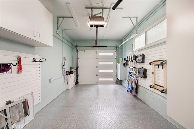 4723 E 3rd St, Long Beach, CA 90814 - garage featuring a garage door opener
