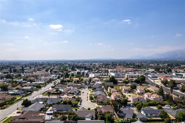 drone / aerial view featuring a mountain view and a residential view