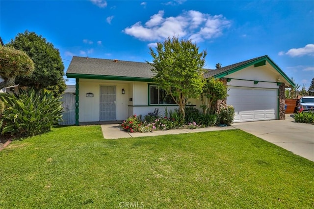 single story home with a garage, concrete driveway, and a front lawn