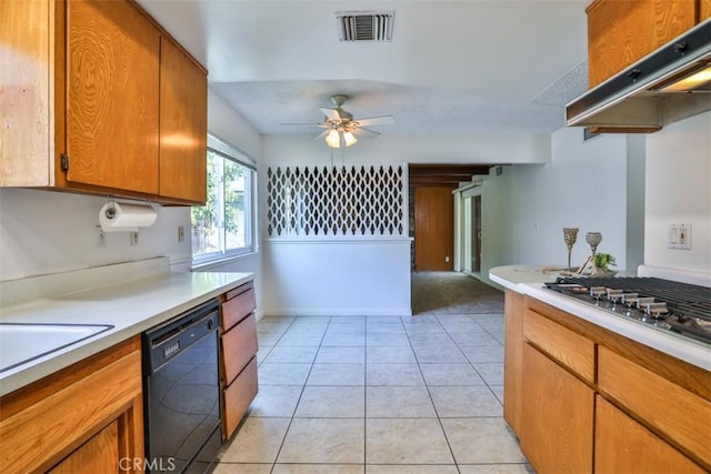 kitchen featuring light countertops, visible vents, stainless steel gas stovetop, and dishwasher