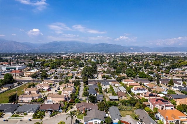 drone / aerial view featuring a mountain view and a residential view