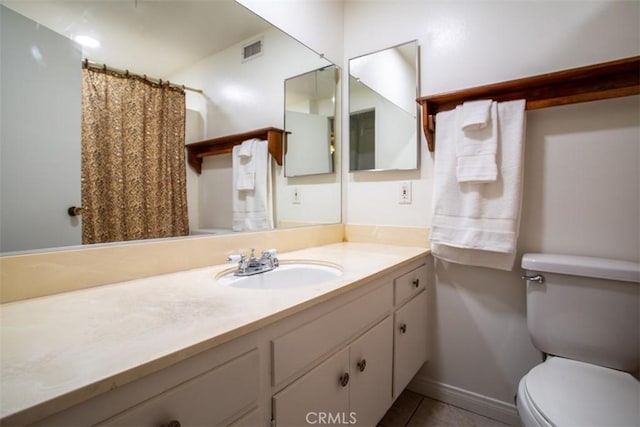 full bath with vanity, visible vents, toilet, baseboards, and tile patterned floors
