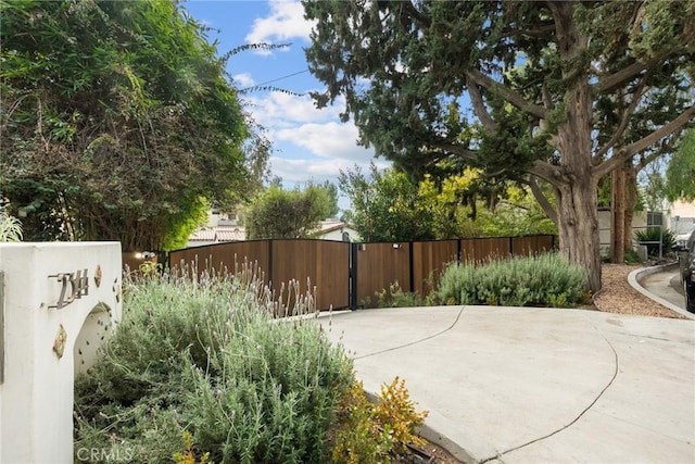view of patio / terrace featuring fence