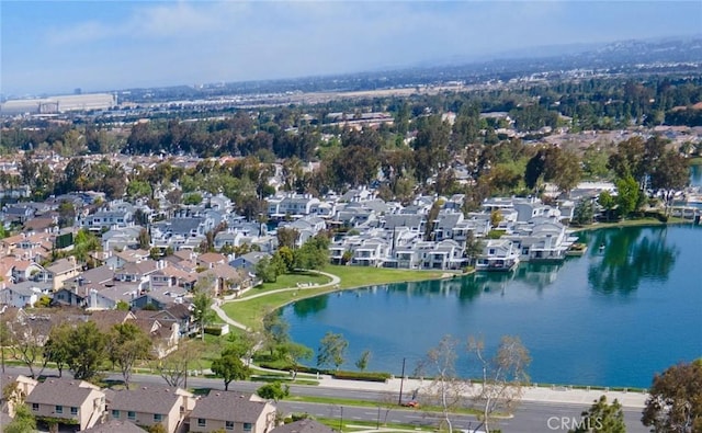 bird's eye view with a water view and a residential view