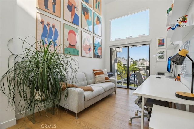 15 Waterway Unit 11, Irvine, CA 92614 - office area featuring light wood-type flooring and a high ceiling