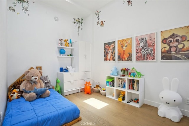 15 Waterway Unit 11, Irvine, CA 92614 - bedroom with wood finished floors and baseboards
