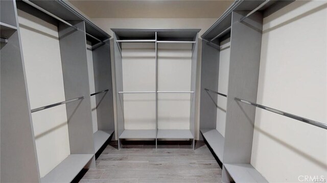 15020 Encanto Dr, Sherman Oaks, CA 91403 - spacious closet with light wood-style flooring