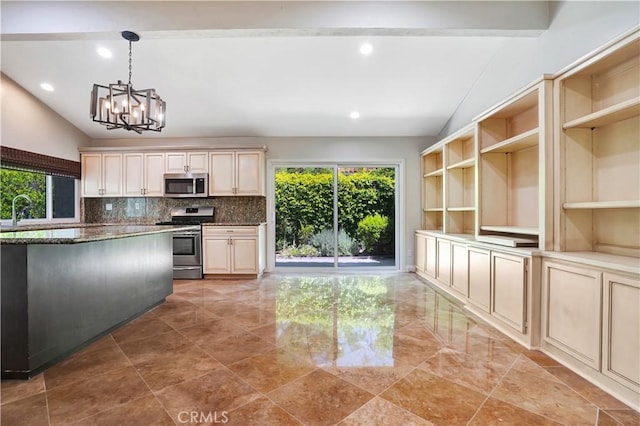 kitchen with a notable chandelier, decorative backsplash, appliances with stainless steel finishes, and recessed lighting
