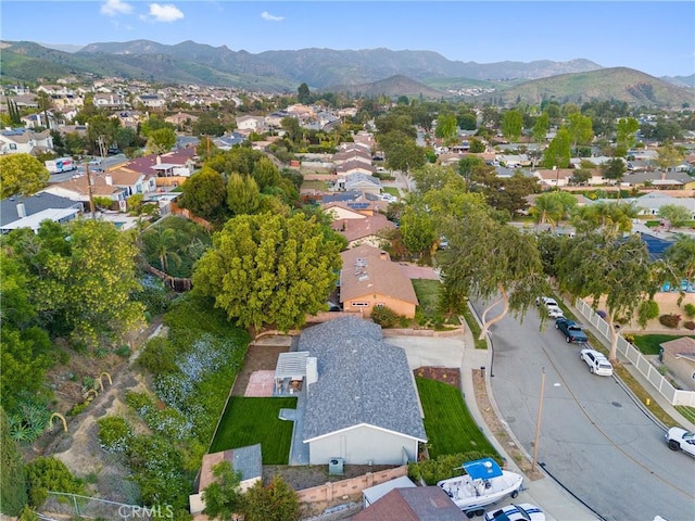 drone / aerial view featuring a mountain view and a residential view