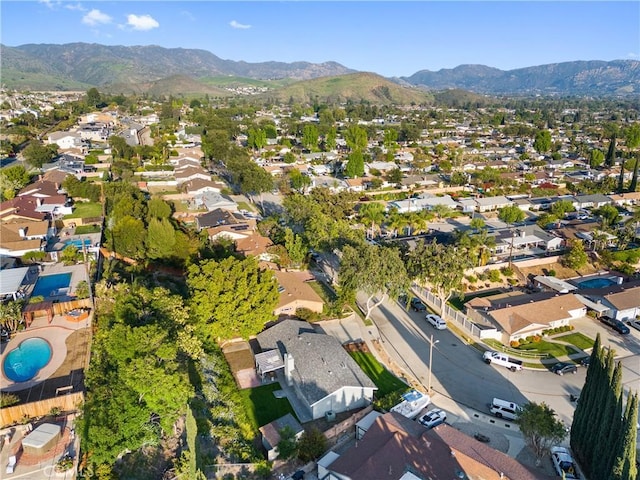 bird's eye view with a mountain view and a residential view