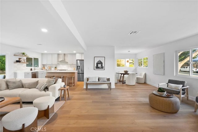 4421 Hempstead St, Simi Valley, CA 93063 - living area featuring plenty of natural light, light wood-style flooring, and recessed lighting