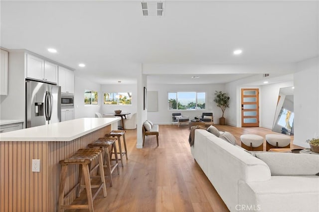 4421 Hempstead St, Simi Valley, CA 93063 - living room featuring recessed lighting and light wood-style floors