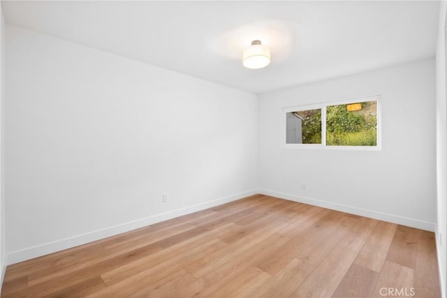 4421 Hempstead St, Simi Valley, CA 93063 - empty room with light wood-style floors and baseboards