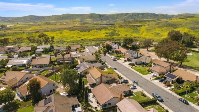birds eye view of property featuring a residential view and a mountain view