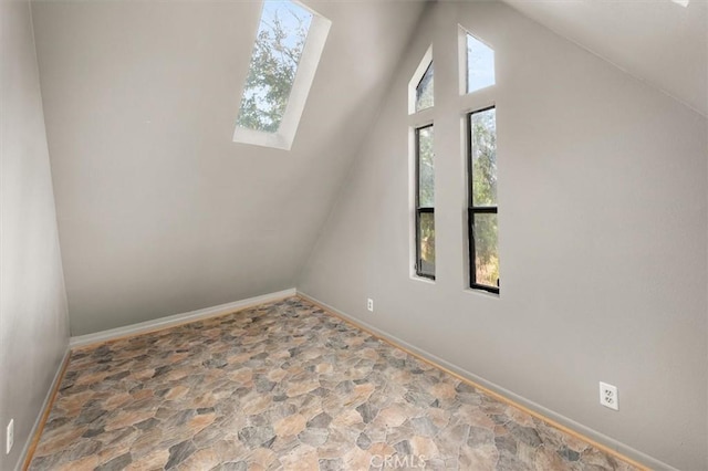 30052 Hunstock St, Castaic, CA 91384 - additional living space featuring stone flooring, lofted ceiling, and baseboards