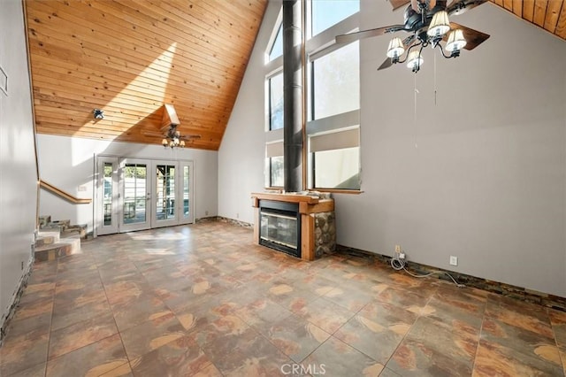 30052 Hunstock St, Castaic, CA 91384 - unfurnished living room featuring ceiling fan, high vaulted ceiling, wooden ceiling, french doors, and a glass covered fireplace
