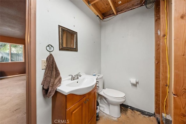 30052 Hunstock St, Castaic, CA 91384 - bathroom featuring vanity, toilet, and concrete flooring