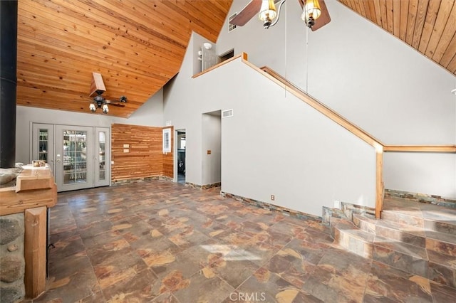 30052 Hunstock St, Castaic, CA 91384 - unfurnished living room featuring wooden ceiling, high vaulted ceiling, a ceiling fan, stone finish floors, and a wood stove