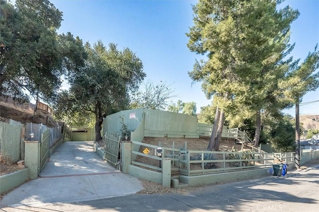 30052 Hunstock St, Castaic, CA 91384 - surrounding community with driveway and a gate