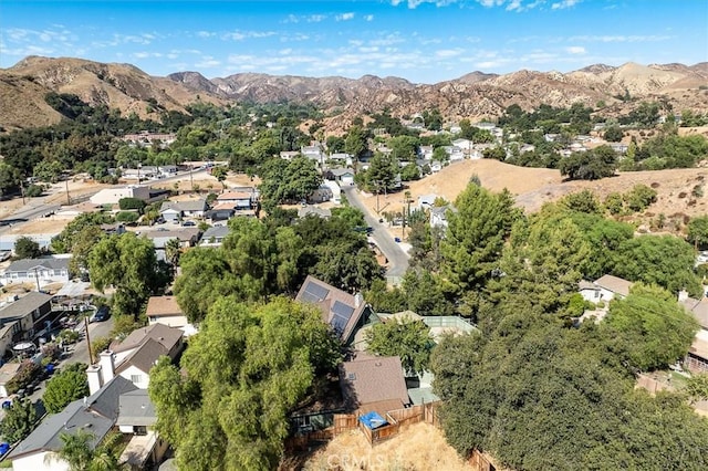 30052 Hunstock St, Castaic, CA 91384 - aerial view of property and surrounding area featuring mountains and nearby suburban area
