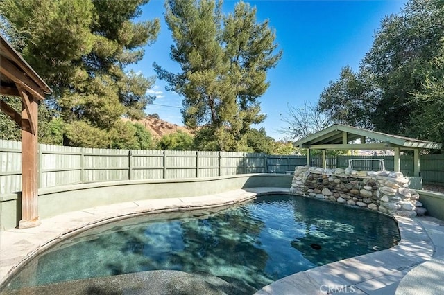 30052 Hunstock St, Castaic, CA 91384 - view of swimming pool with a gazebo and a fenced backyard
