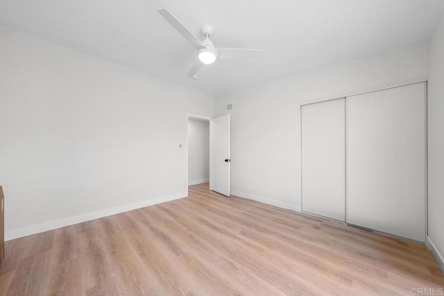 2263 Finch Ln, San Diego, CA 92123 - unfurnished bedroom with a closet, wood finished floors, baseboards, and a ceiling fan