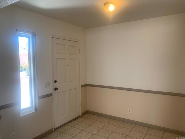 5612 Old Ranch Rd, Oceanside, CA 92057 - foyer featuring light tile patterned flooring and baseboards