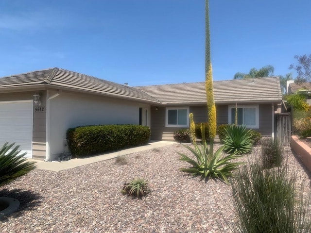 5612 Old Ranch Rd, Oceanside, CA 92057 - ranch-style home featuring stucco siding, an attached garage, and a tile roof