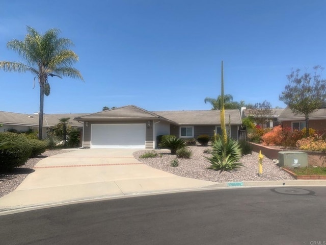 5612 Old Ranch Rd, Oceanside, CA 92057 - ranch-style home with a garage, driveway, and a tiled roof