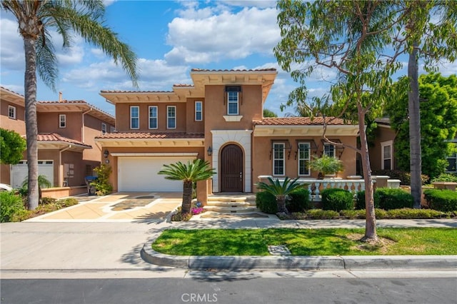 19 Ivanhoe, Irvine, CA 92602 - mediterranean / spanish-style house with a garage, stucco siding, a tiled roof, and concrete driveway