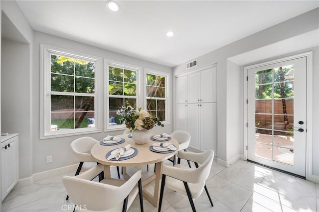 19 Ivanhoe, Irvine, CA 92602 - dining space with recessed lighting, visible vents, and baseboards
