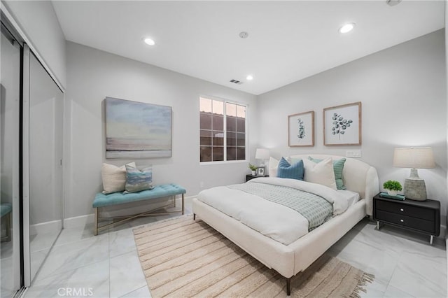 19 Ivanhoe, Irvine, CA 92602 - bedroom with marble finish floor, recessed lighting, and a closet