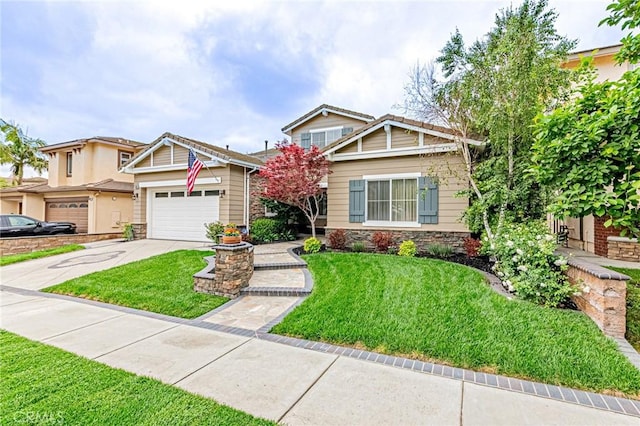 craftsman house with an attached garage, a front lawn, driveway, and stone siding