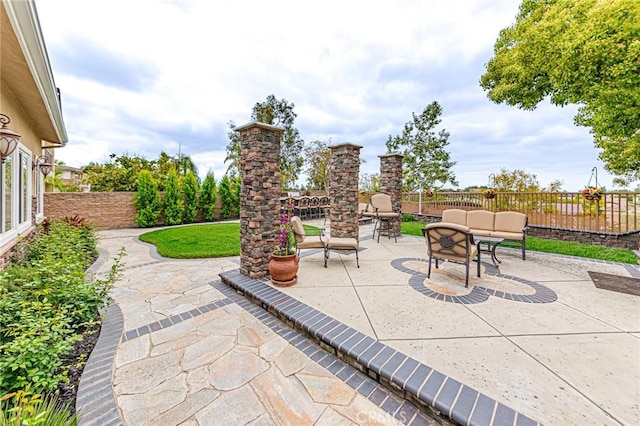 view of patio / terrace with a fenced backyard and an outdoor hangout area