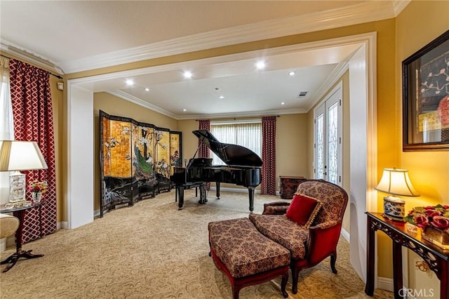 sitting room featuring recessed lighting, baseboards, ornamental molding, and carpet