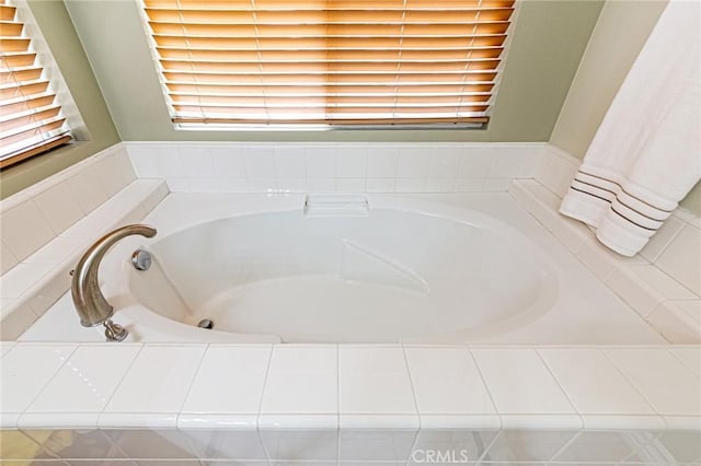 bathroom featuring a garden tub