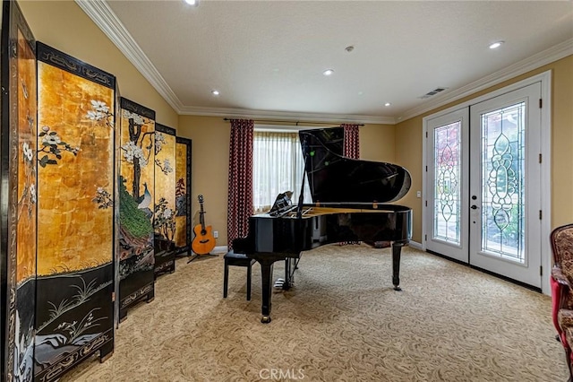 sitting room featuring visible vents, carpet, baseboards, and french doors