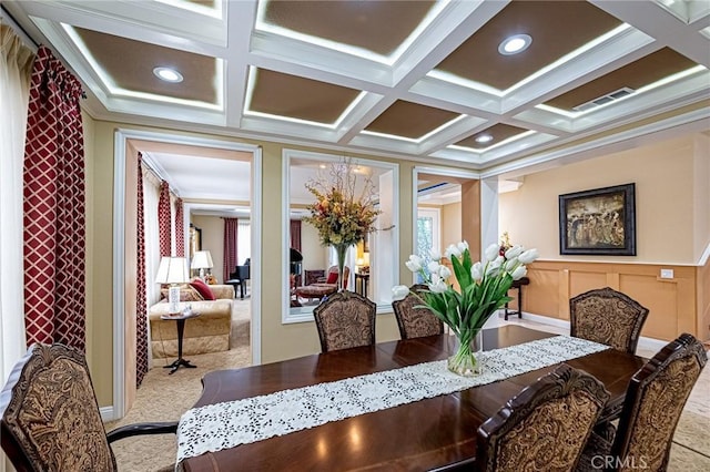 dining area featuring recessed lighting, ornamental molding, coffered ceiling, and beamed ceiling